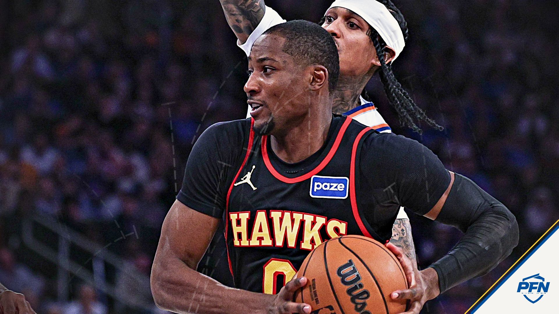 Atlanta Hawks forward Jonathan Kuminga (0) drives to the basket against New York Knicks guard Jordan Clarkson (00) during the second half of the 2026 NBA Playoffs at Madison Square Garden.
