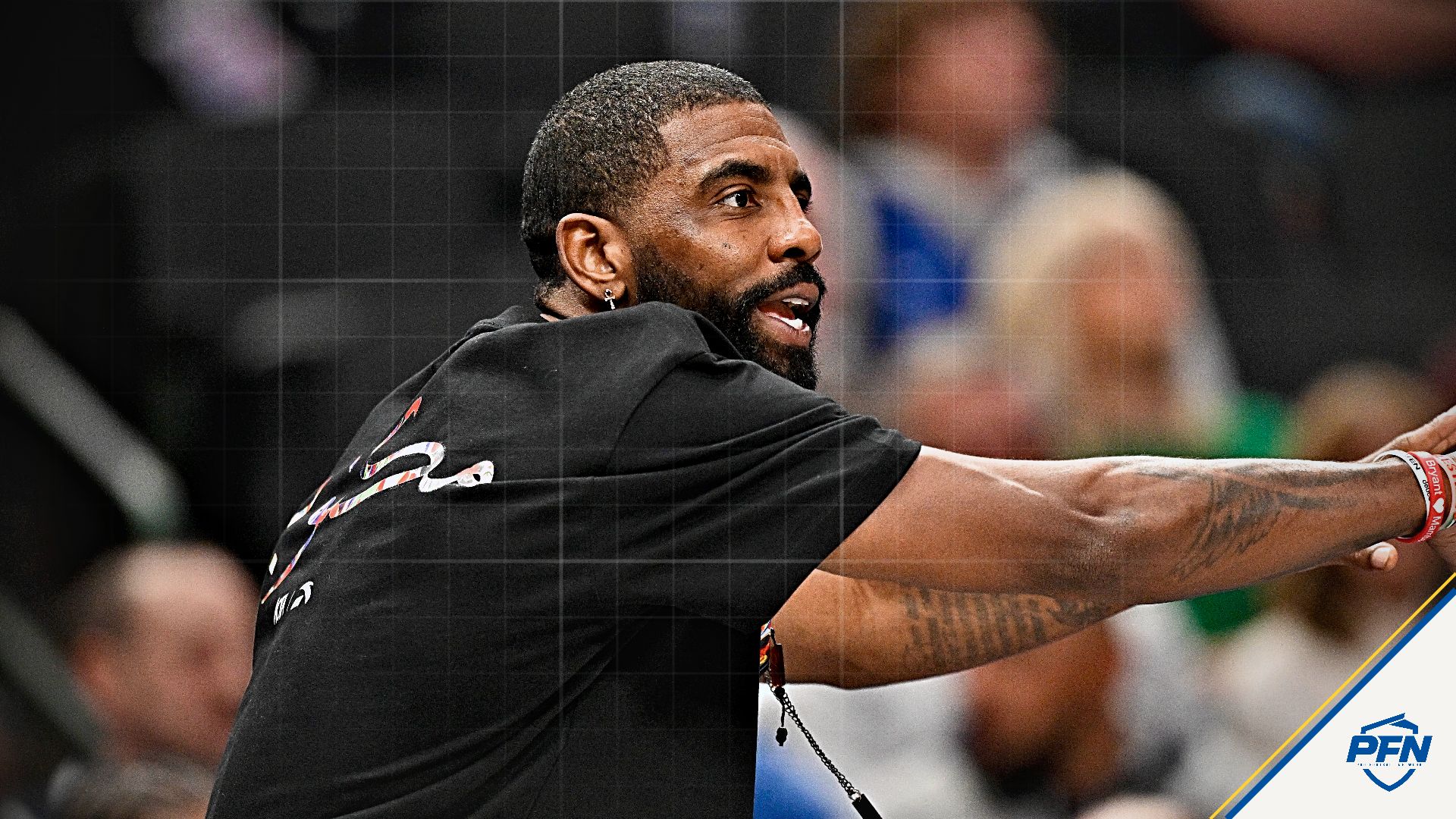 Dallas Mavericks guard Kyrie Irving (11) motions to his teammates during the game between the Mavericks and the Nets at the American Airlines Center.