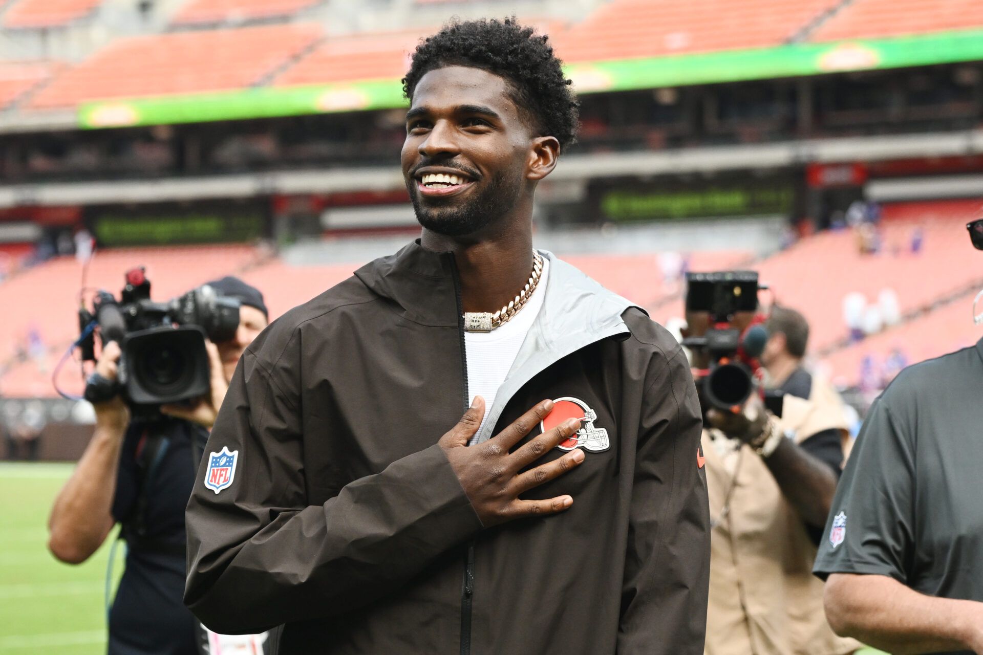 Cleveland Browns quarterback Shedeur Sanders (2) acknowledges fans after the game between the Browns and the Buffalo Bills during the second half at Huntington Bank Field.