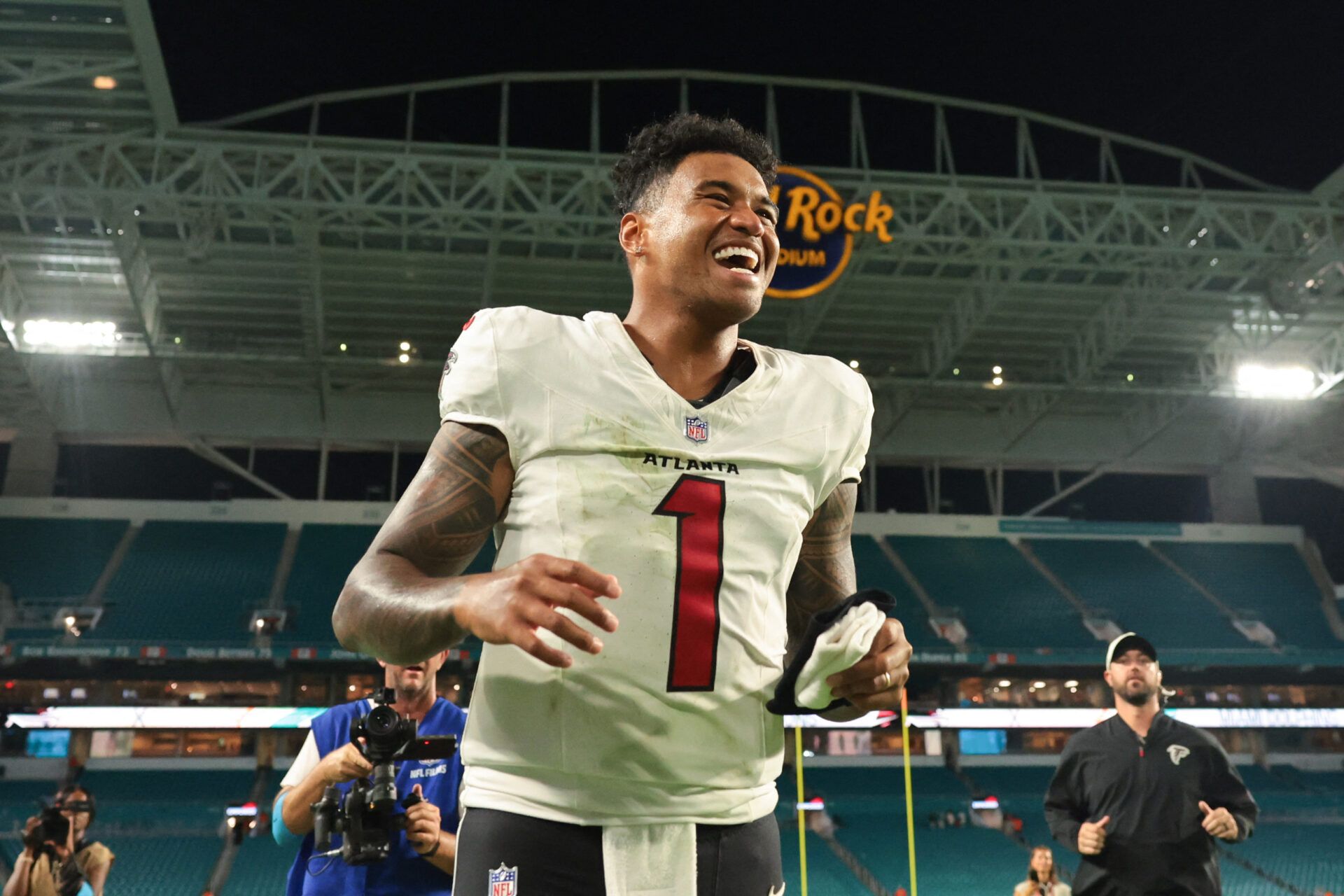 Atlanta Falcons quarterback Tua Tagovailoa (1) reacts as he exits the field after the game against the Miami Dolphins at Hard Rock Stadium.