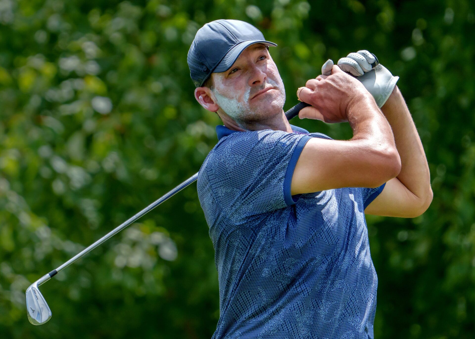Former Dallas Cowboys quarterback Tony Romo, now an NFL broadcast analyst for CBS, watches his tee shot off No. 11 during the OSF Children's Hospital of Illinois Championship pro-am Tuesday, June 24, 2025 at Metamora Fields Golf Club in Metamora.