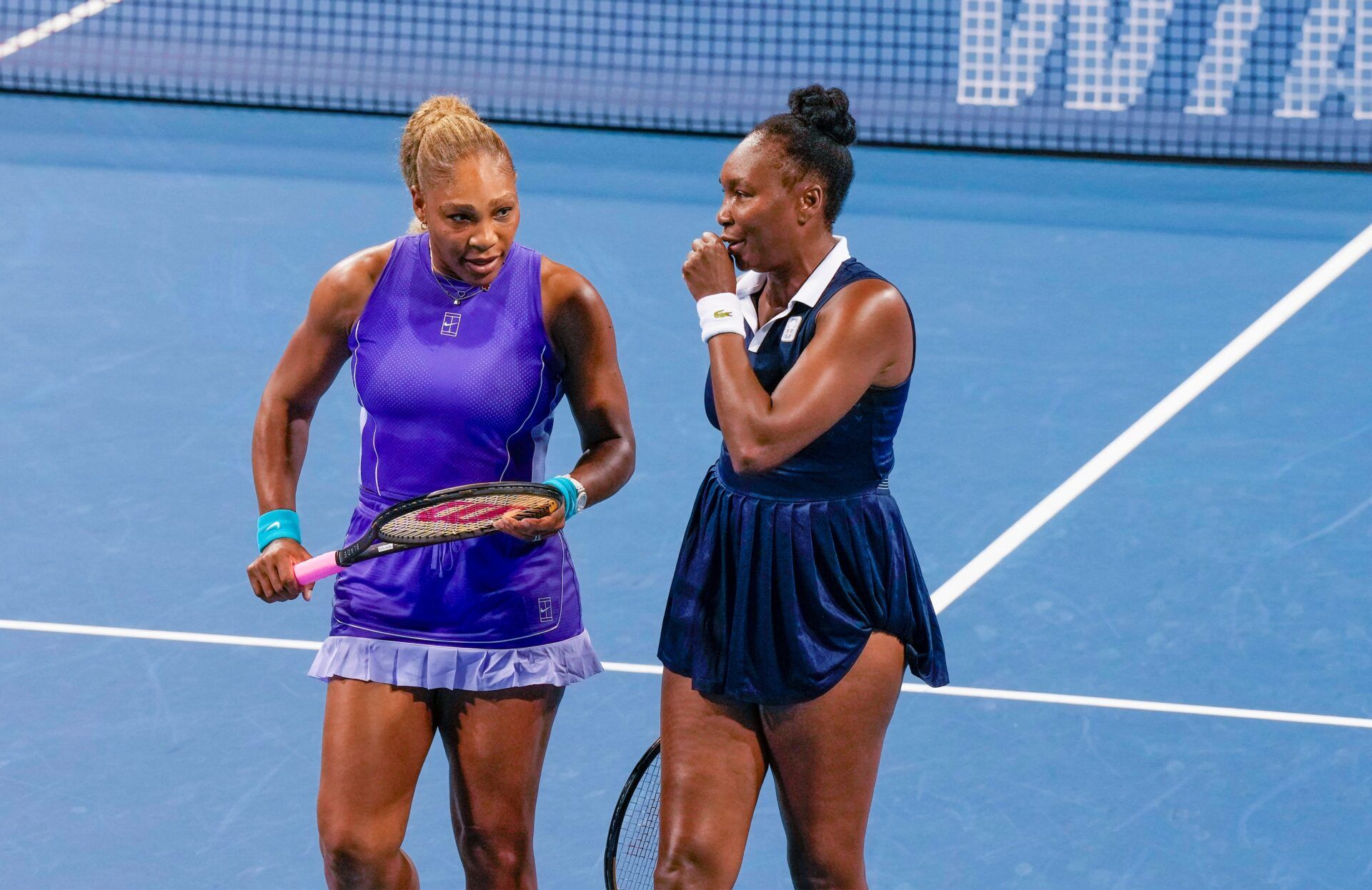 Serena Williams and her sister, Venus Williams, compete in a doubles match during the Cincinnati Open at the Lindner Family Tennis Center in Mason on Aug. 17, 2026. The sisters fell to Marta Kostyuk and Peyton Stearns, 6-2, 1-6, 10-8.