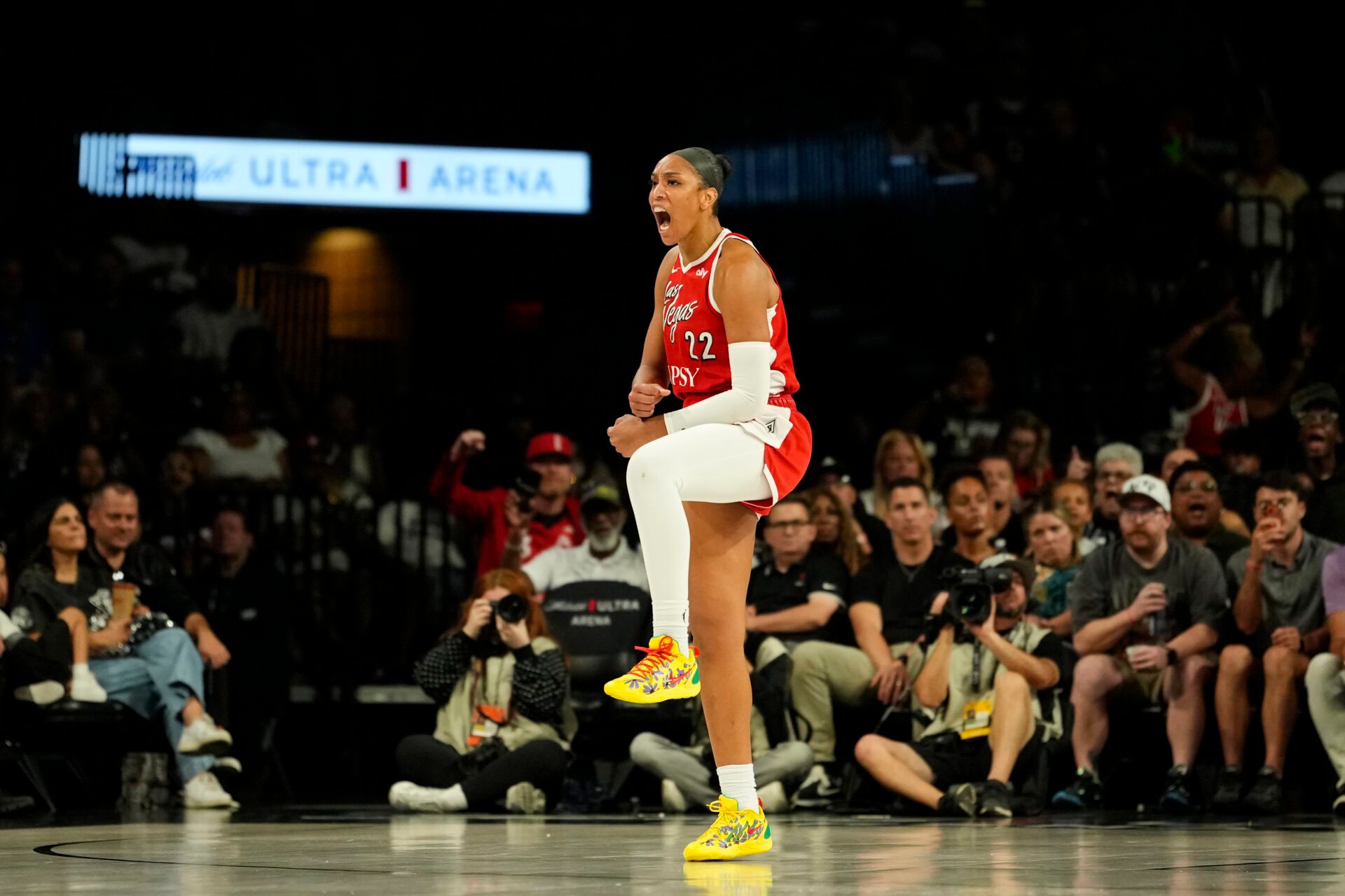 Las Vegas Aces center A'ja Wilson (22) reacts after scoring against the Connecticut Sun during the third quarter of a WNBA basketball game at Michelob Ultra Arena.