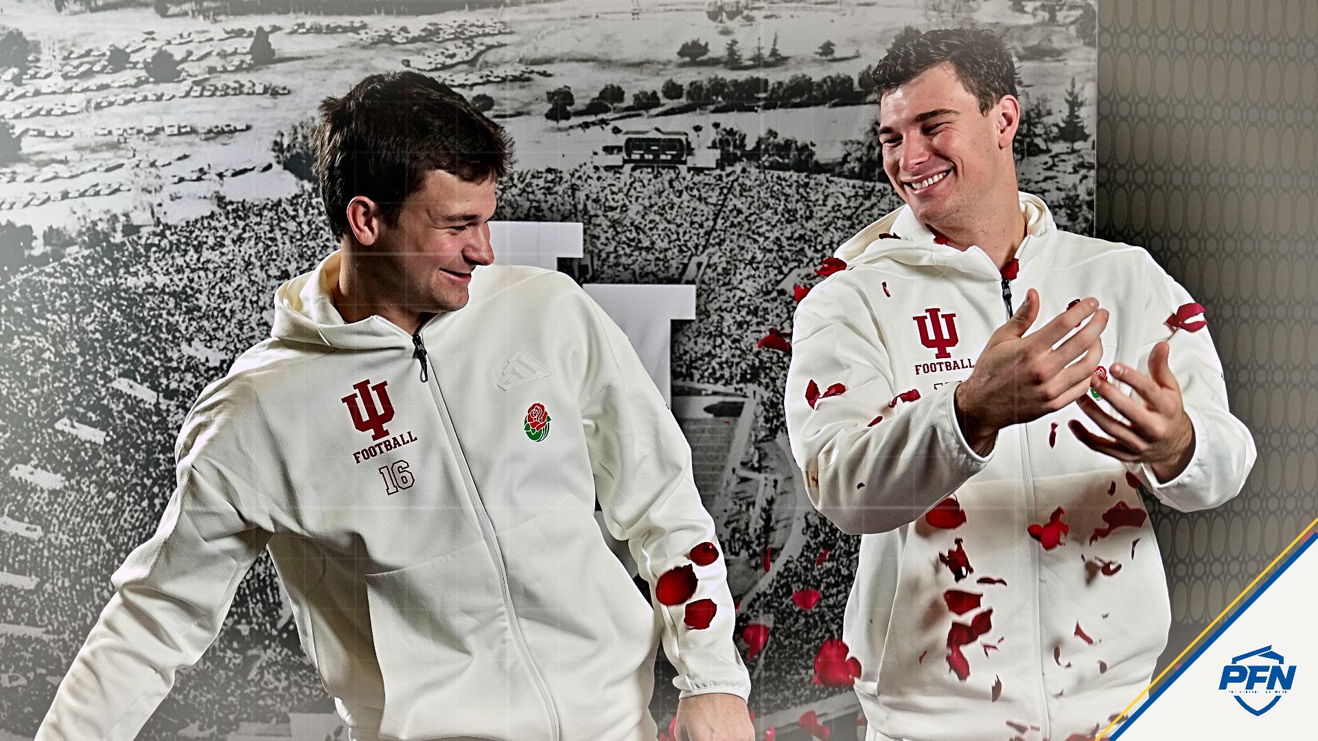Indiana Hoosiers quarterback Alberto Mendoza (16) throws a hand full of roses at his brother Indiana Hoosiers quarterback Fernando Mendoza (15) on Tuesday, Dec. 30, 2025, during Media Day interviews ahead of the Rose Bowl game against Alabama Crimson Tide at the Sheraton Grand Los Angeles.