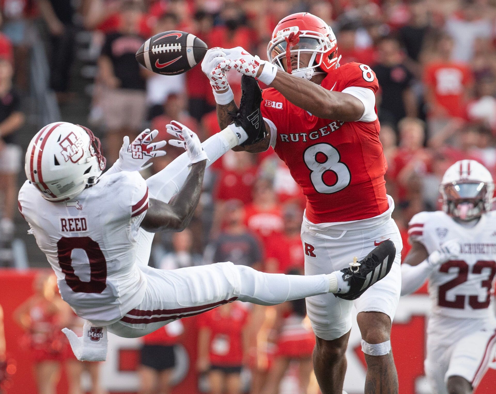 Massachusetts Minutemen at Rutgers Scarlet Knights football in Piscataway, New Jersey on Thursday, September 3, 2026. Rutgers #KJ Duff attempts to make a catch as UMASS #0 Isiah Reed breaks up the play.