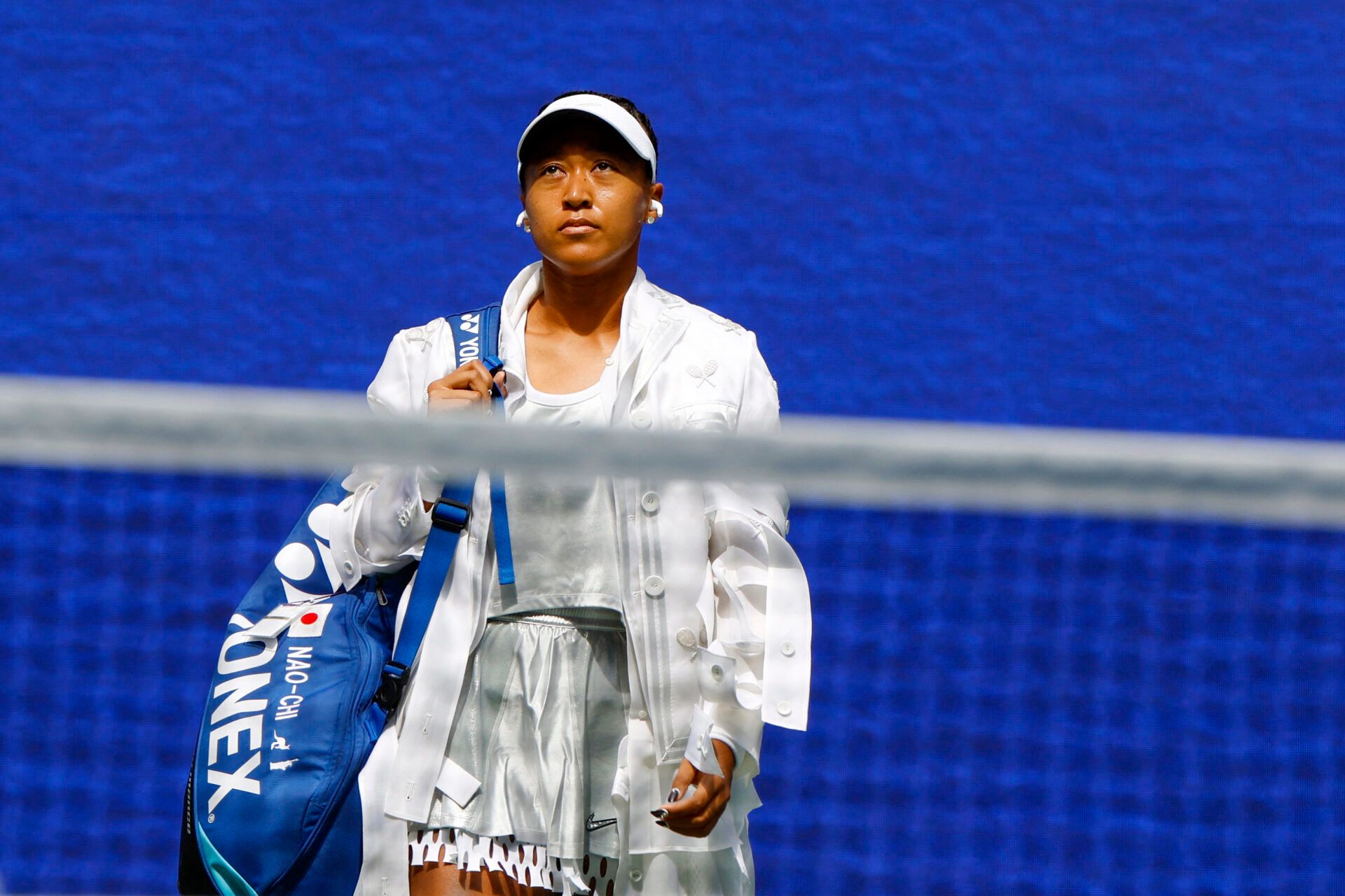 Japan's Naomi Osaka enters the court before her second round match against Czech Republic's Katerina Siniakova.