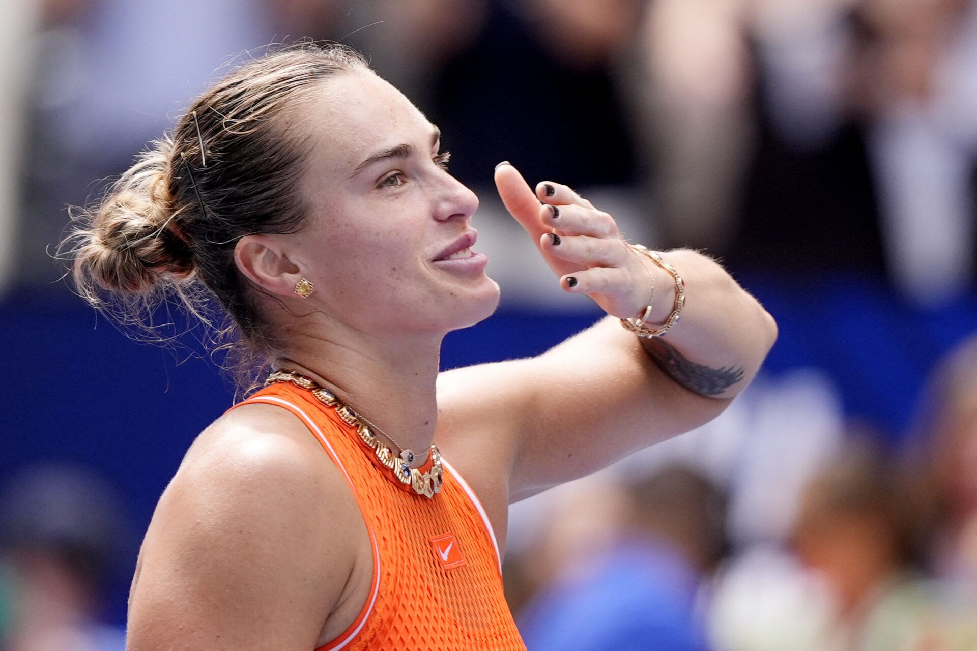 Belarus' Aryna Sabalenka celebrates winning her third round match against Uzbekistan's Kamilla Rakhimova.