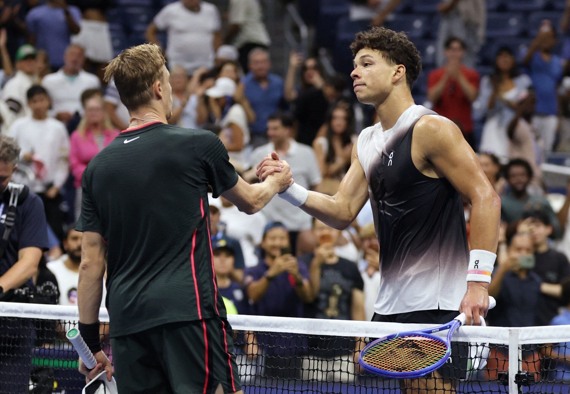 Tennis - U.S. Open - Flushing Meadows, New York, United States - September 5, 2026 Ben Shelton of the U.S. shakes hands with Canada's Denis Shapovalov after winning his third round match REUTERS/Brendan Mcdermid
