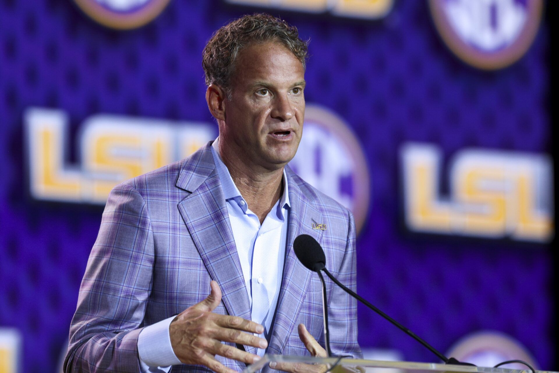 LSU Tigers head coach Lane Kiffin speaks to the press during SEC Football Kickoff Media Day at the Tampa Marriott.