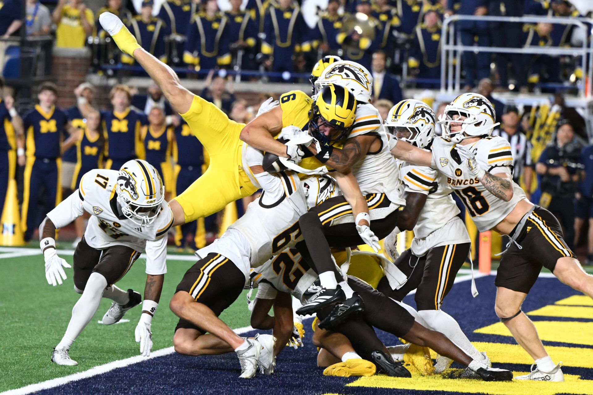 Michigan wide receiver JJ Buchanan (6) catches a Hail Mary pass for a touchdown with no time on the clock to beat Western Michigan at Michigan Stadium.