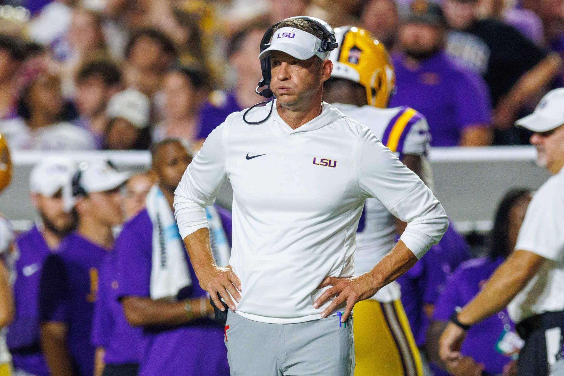 LSU Tigers head coach Lane Kiffin watches game play against the Clemson Tigers during the first half at Tiger Stadium.