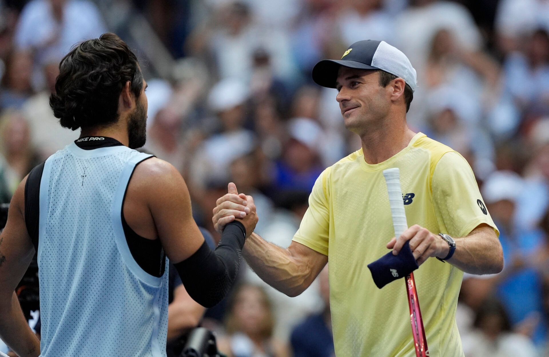 Tennis - U.S. Open - Flushing Meadows, New York, United States - September 6, 2026 Spain's Carlos Alcaraz shakes hands with Tommy Paul of the U.S. after winning their round of 16 match REUTERS/Eduardo Munoz
