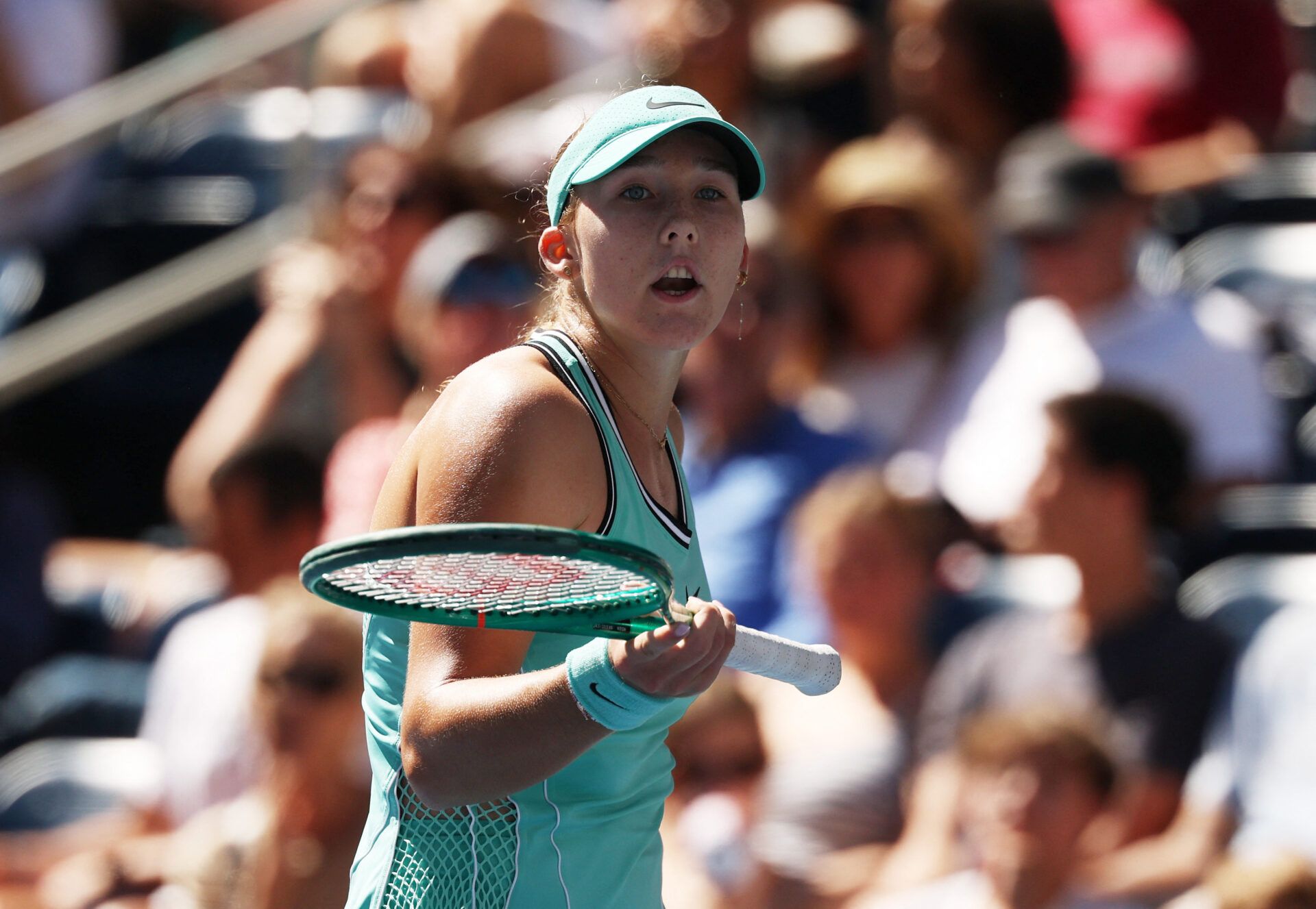 Russia's Mirra Andreeva reacts during her round of 16 match against Austria's Anastasia Potapova.