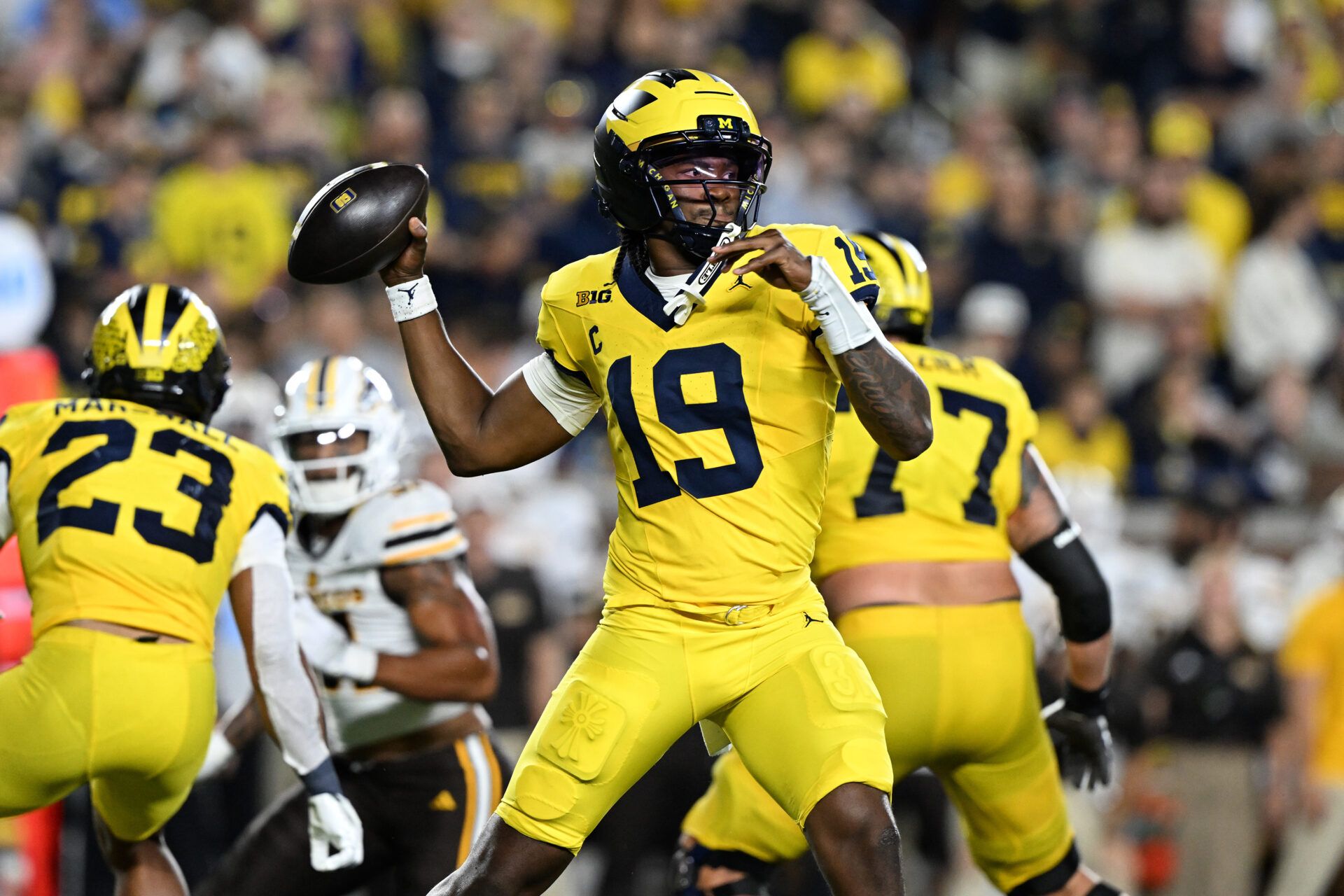 Michigan quarterback Bryce Underwood (19) throws an interception against Western Michigan in the second quarter at Michigan Stadium.